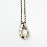 Silver Wrapped Pendant With Rainbow Moonstone By Junko Stickney