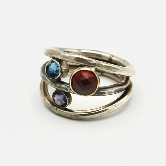 Garnet, Ioline, and Topaz Ring By Janet Kaufman