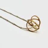 Gold Mobius Necklace By Kathleen Maley