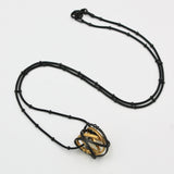 Gold and Oxidized Silver Mobius Necklace By Kathleen Maley