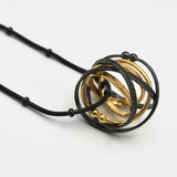 Gold and Oxidized Silver Mobius Necklace By Kathleen Maley