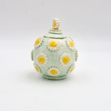 Daisy Container By Geraldine GaNun