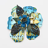 Blue Rosette Tin Pin By Suzane Beaubrun